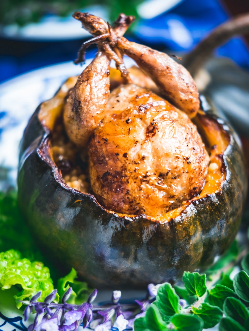 Roasted Munchkin Pumpkins stuffed with Cous Cous topped with Roasted Quail